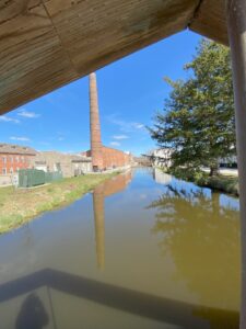 View of the Woolen Mill (left) and Hotel Millright today. Photographer looking east along the Mill Race.